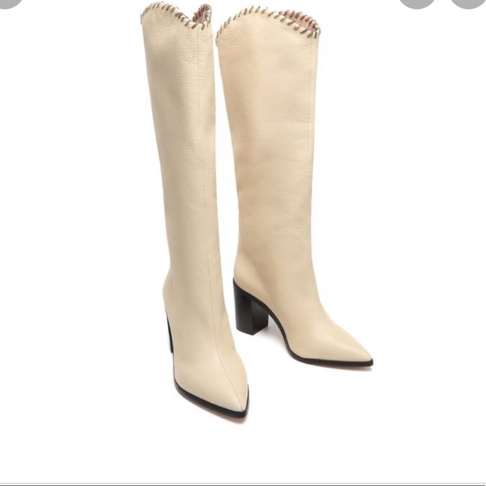 Tall yummy cream boots .